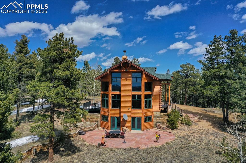 a view of a building with a yard