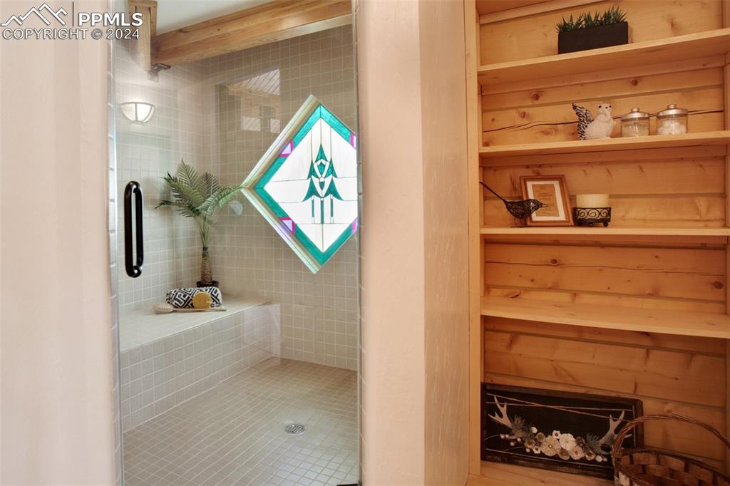 527 Cougar Point Divide, CO 80814 - Photo 28 of 50 a bathroom with a sink and a mirror