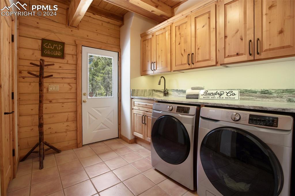 527 Cougar Point Divide, CO 80814 - Photo 33 of 50 a utility room with dryer and washer