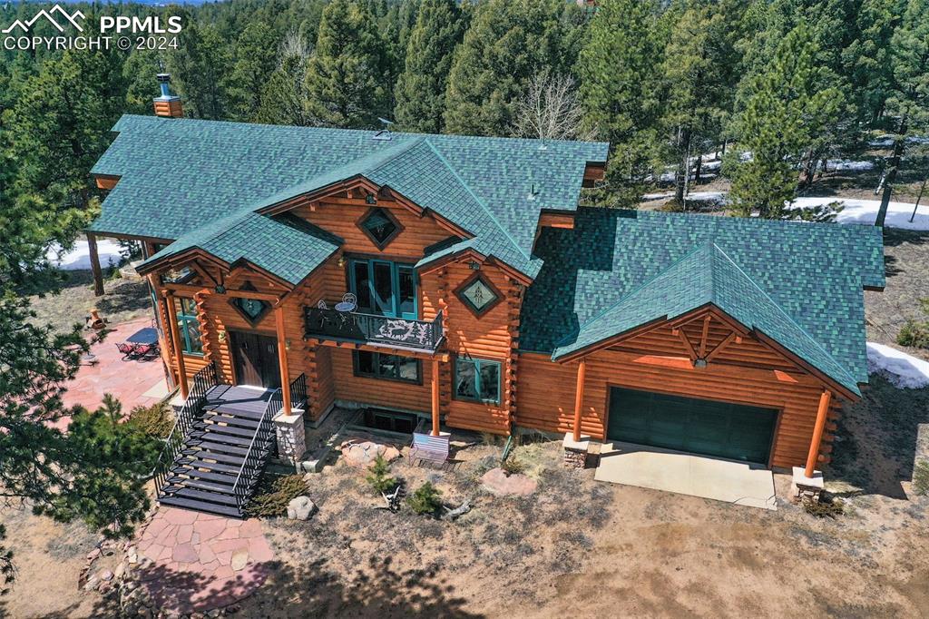 527 Cougar Point Divide, CO 80814 - Photo 4 of 50 an aerial view of a house with a yard
