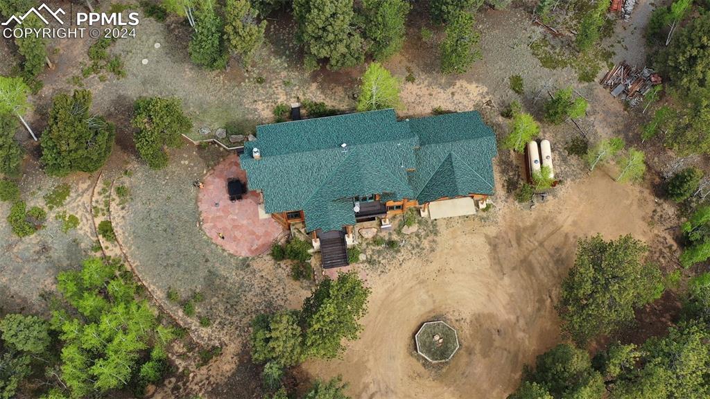 527 Cougar Point Divide, CO 80814 - Photo 49 of 50 an aerial view of a house with a yard