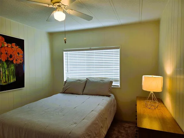 a view of a balcony with wooden floor