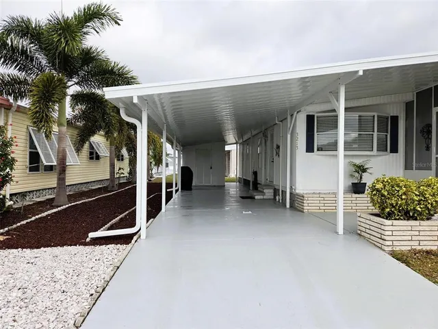 a view of front door and porch with seating space