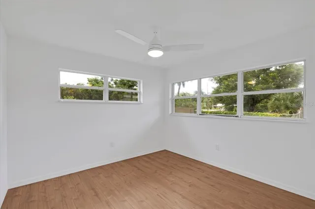 an empty room with windows