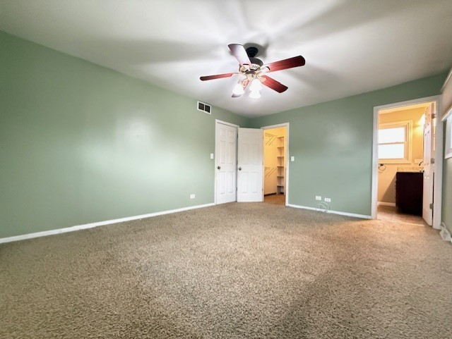 969 Dearborn Circle Carol Stream, IL 60188 - Photo 12 of 46 a view of an empty room with window and chandelier fan