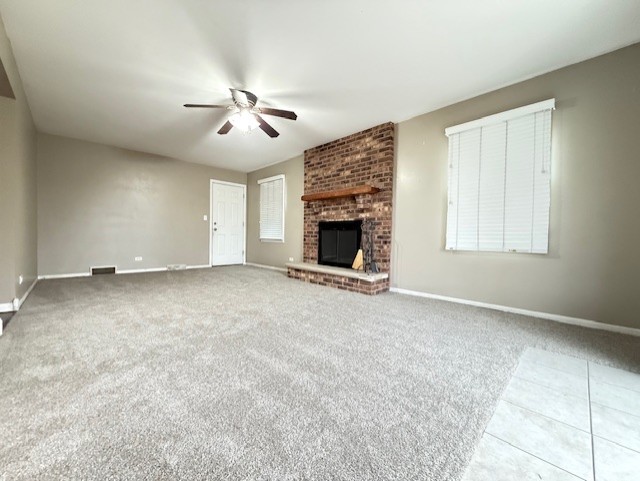 969 Dearborn Circle Carol Stream, IL 60188 - Photo 8 of 46 an empty room with windows and fireplace
