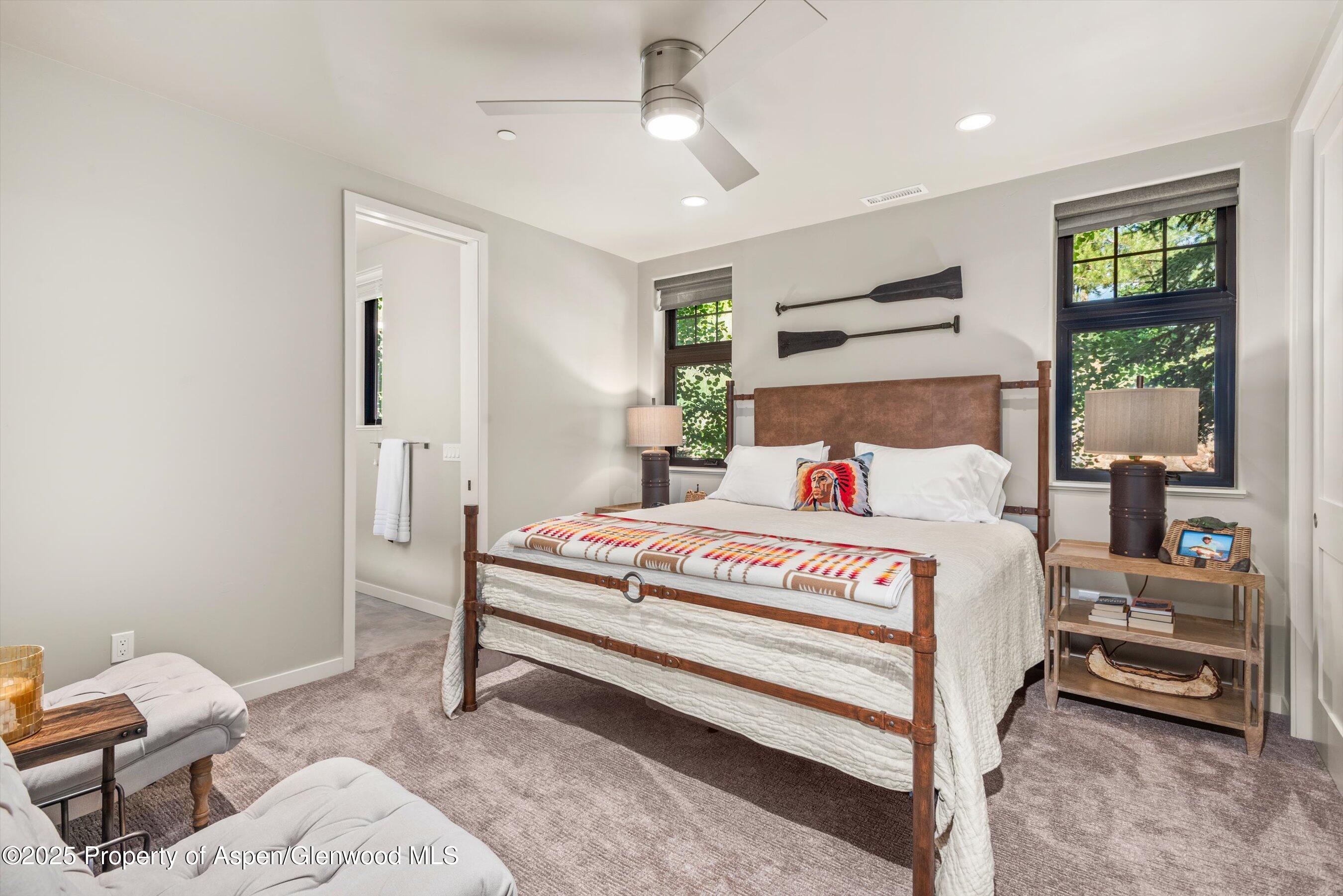 102 Wild Spring Lane Basalt, CO 81621 - Photo 36 of 51 a bedroom with a bed and a window