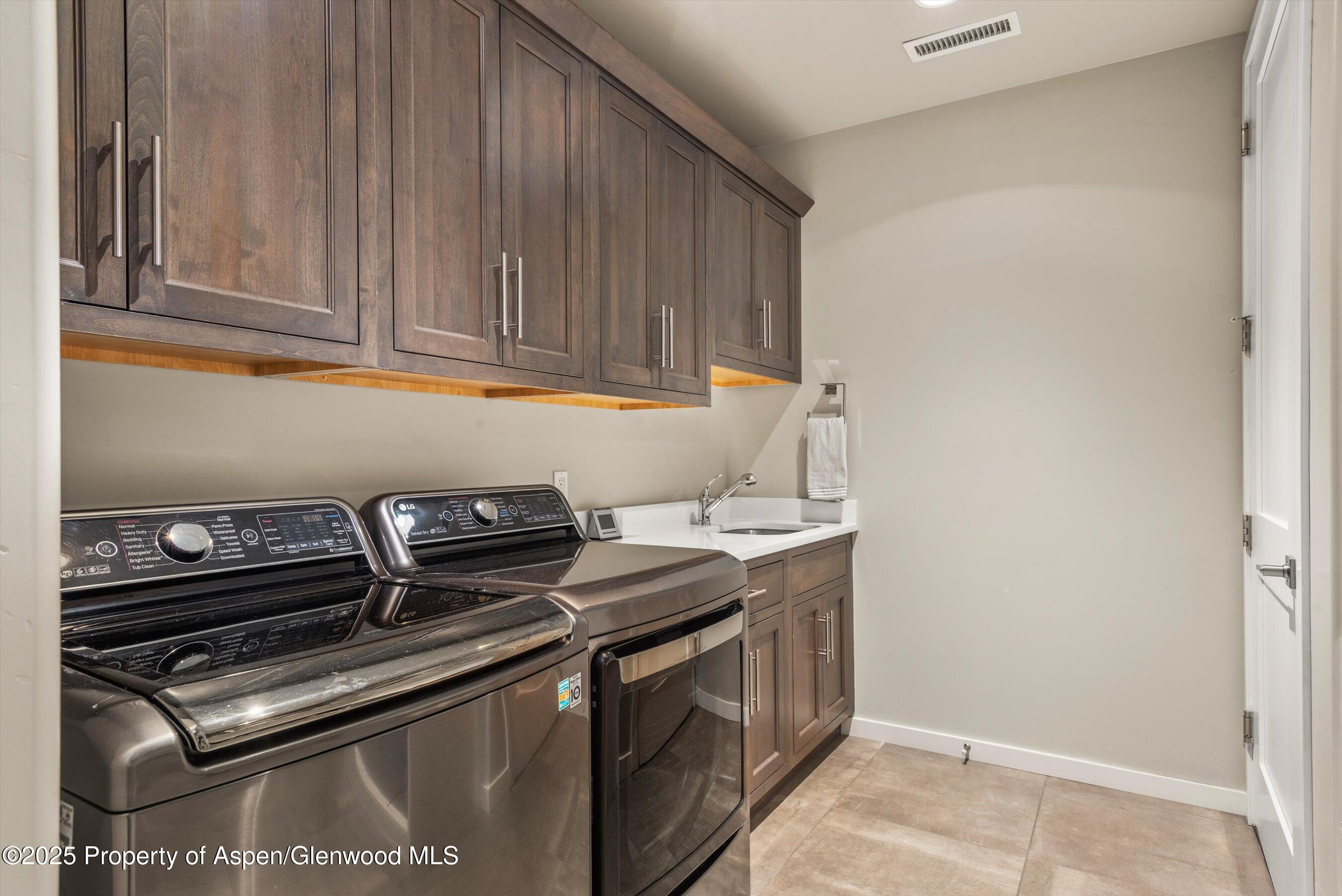 102 Wild Spring Lane Basalt, CO 81621 - Photo 39 of 51 a kitchen with a stove and a microwave