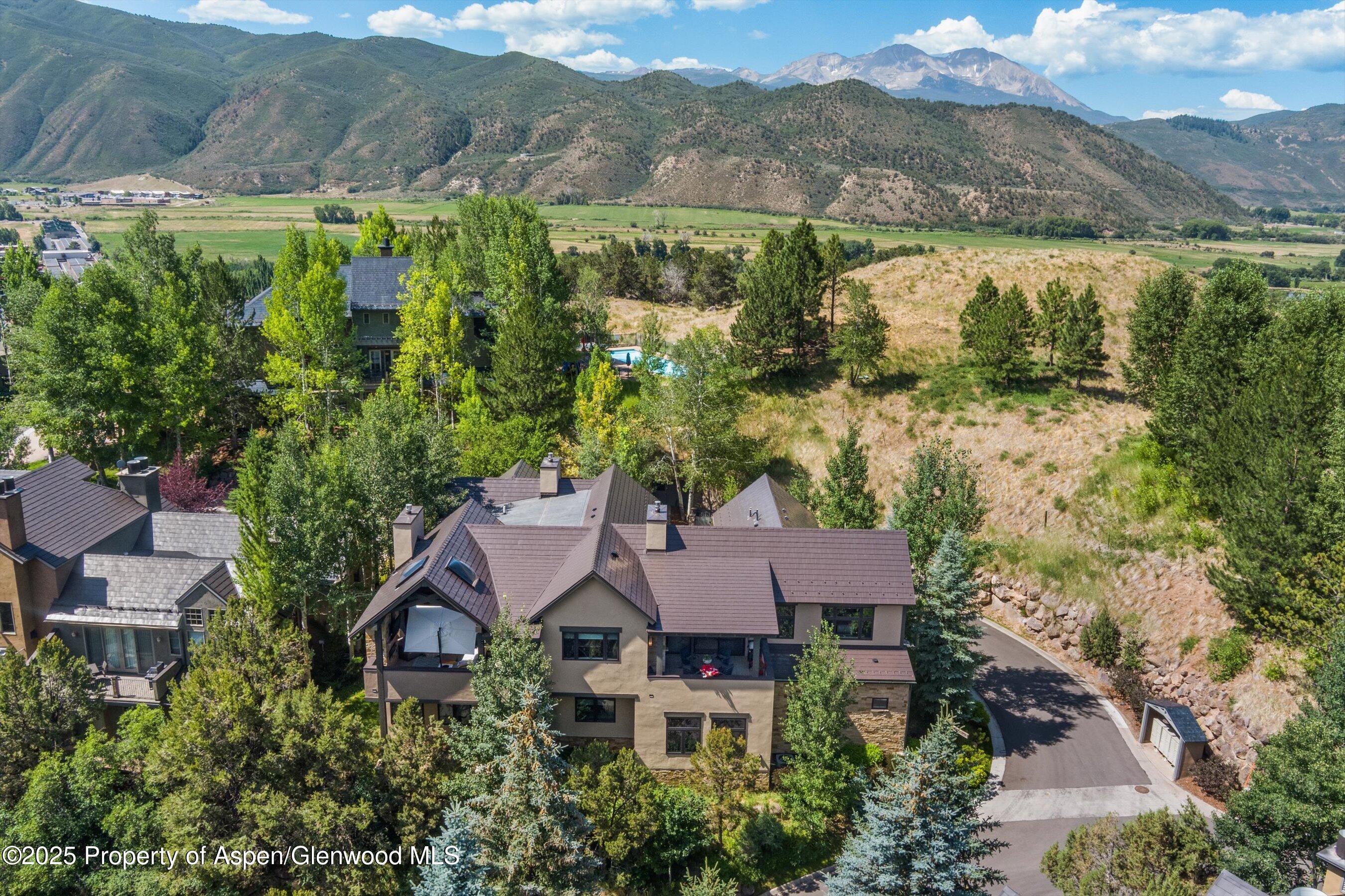 102 Wild Spring Lane Basalt, CO 81621 - Photo 47 of 51 an aerial view of house with yard and lake view