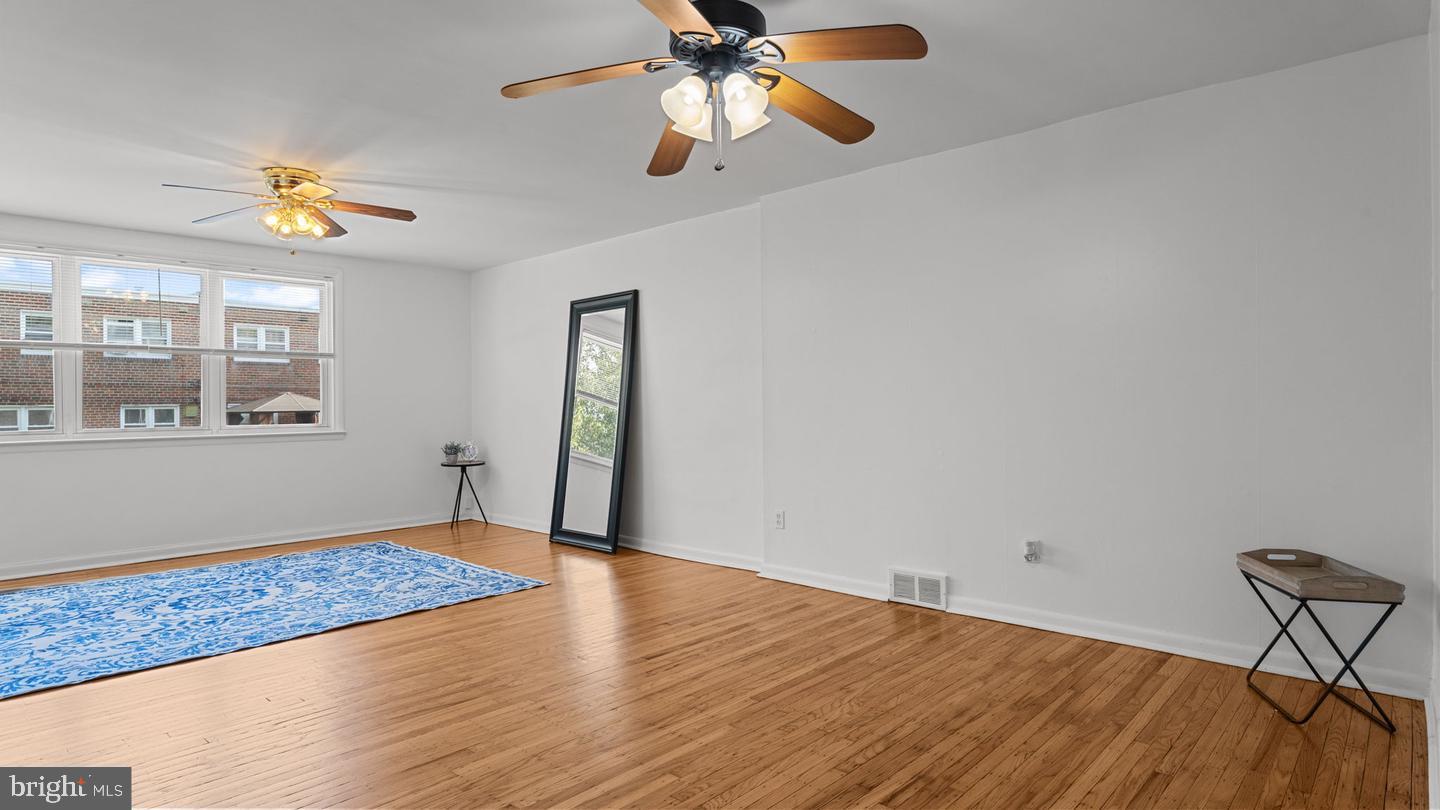 3045 Comly Road Philadelphia, PA 19154 - Photo 12 of 29 a view of an empty room with window and wooden floor