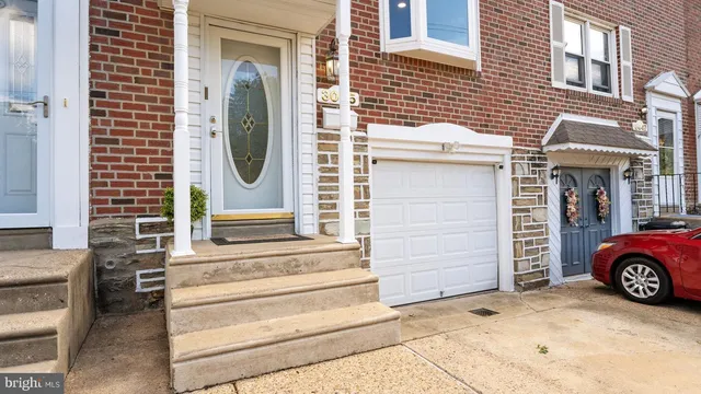 a view of a house with a parking space