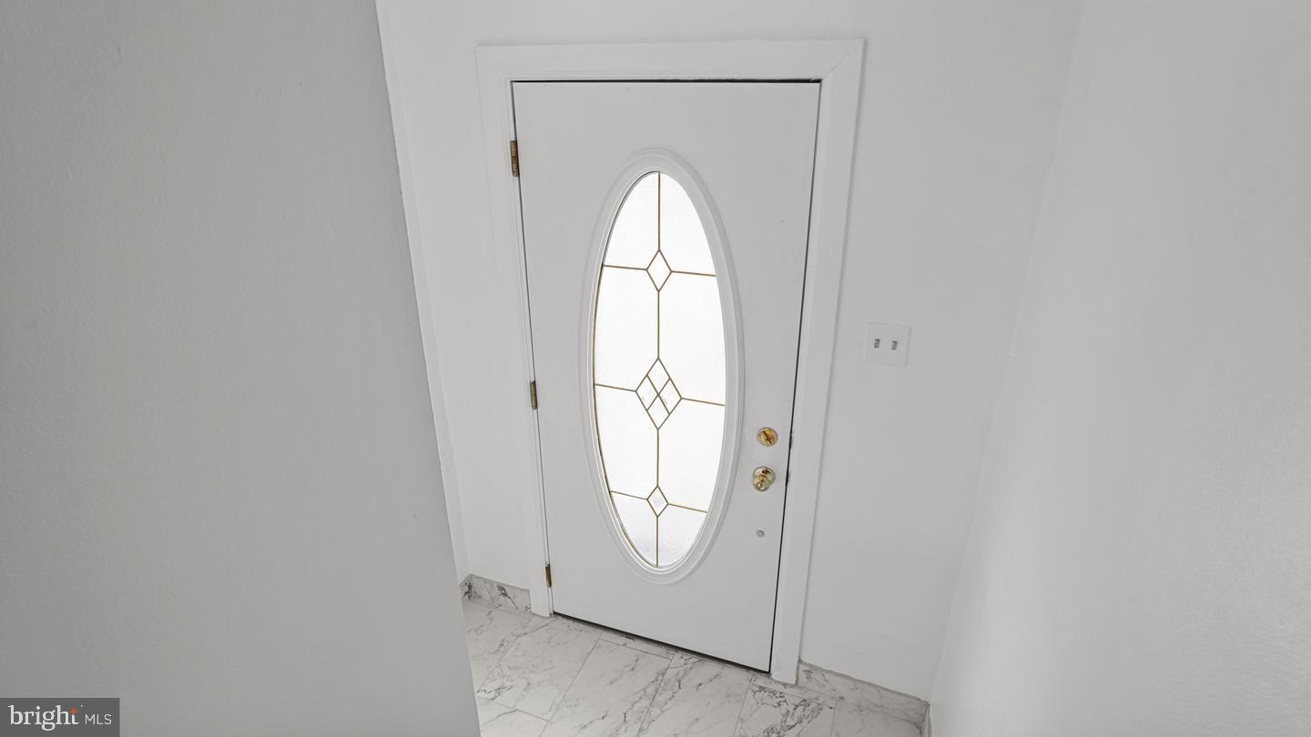 3045 Comly Road Philadelphia, PA 19154 - Photo 3 of 29 with view of a livingroom with a bathroom and a window