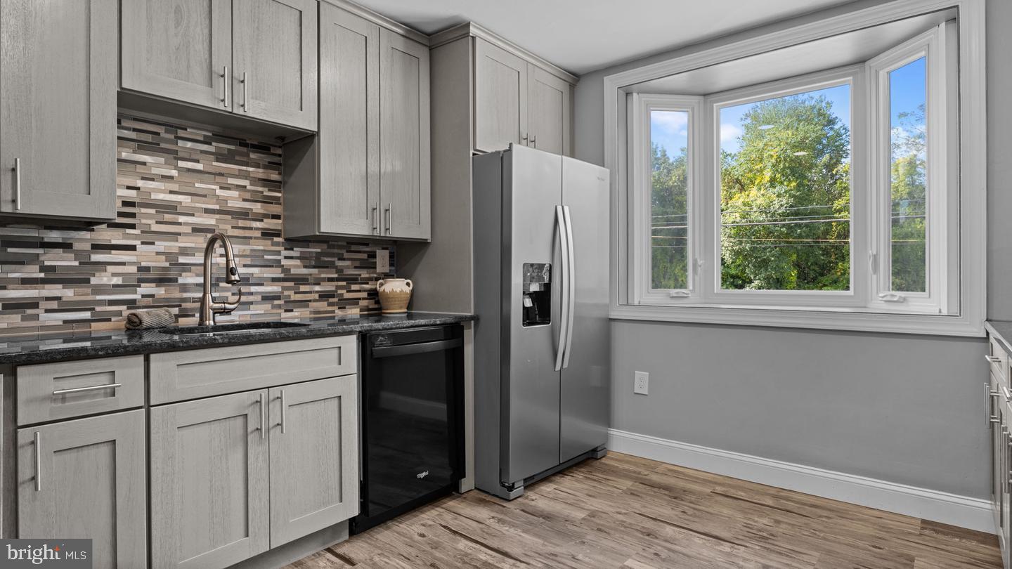 3045 Comly Road Philadelphia, PA 19154 - Photo 6 of 29 a kitchen with stainless steel appliances granite countertop a refrigerator and a sink