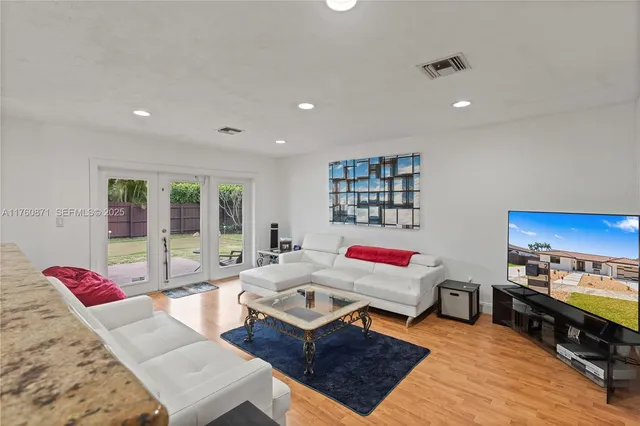 a living room with furniture and a couch