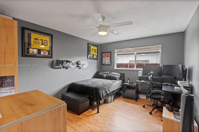 a bathroom with a toilet a sink and shower