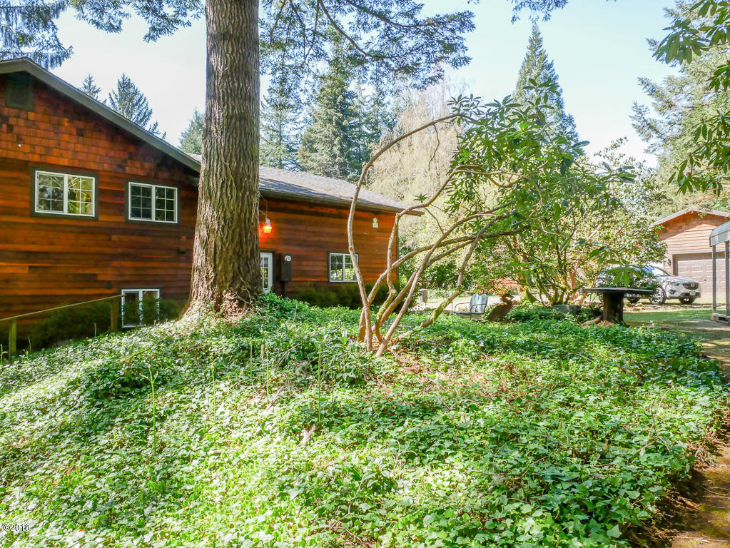 1340 Logsden Road Siletz, OR 97380 - Photo 49 of 60 Side yard