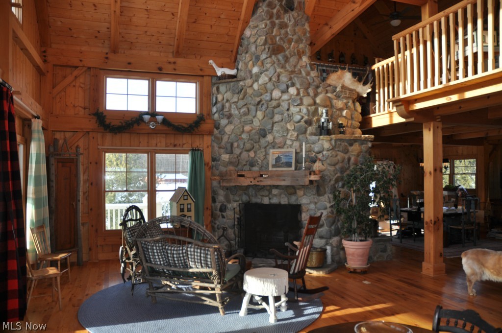 12463 Pond Road Burton, OH 44021 - Photo 3 of 23 Great Room with large floor to ceiling fireplace