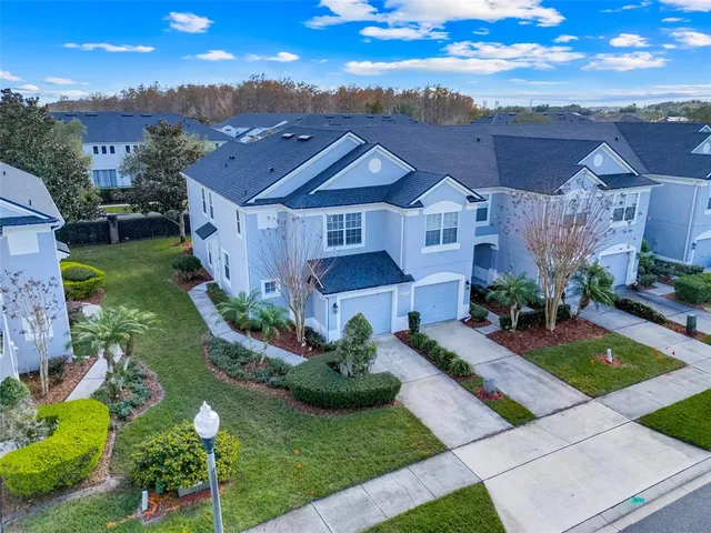a view of house with garden space and street view