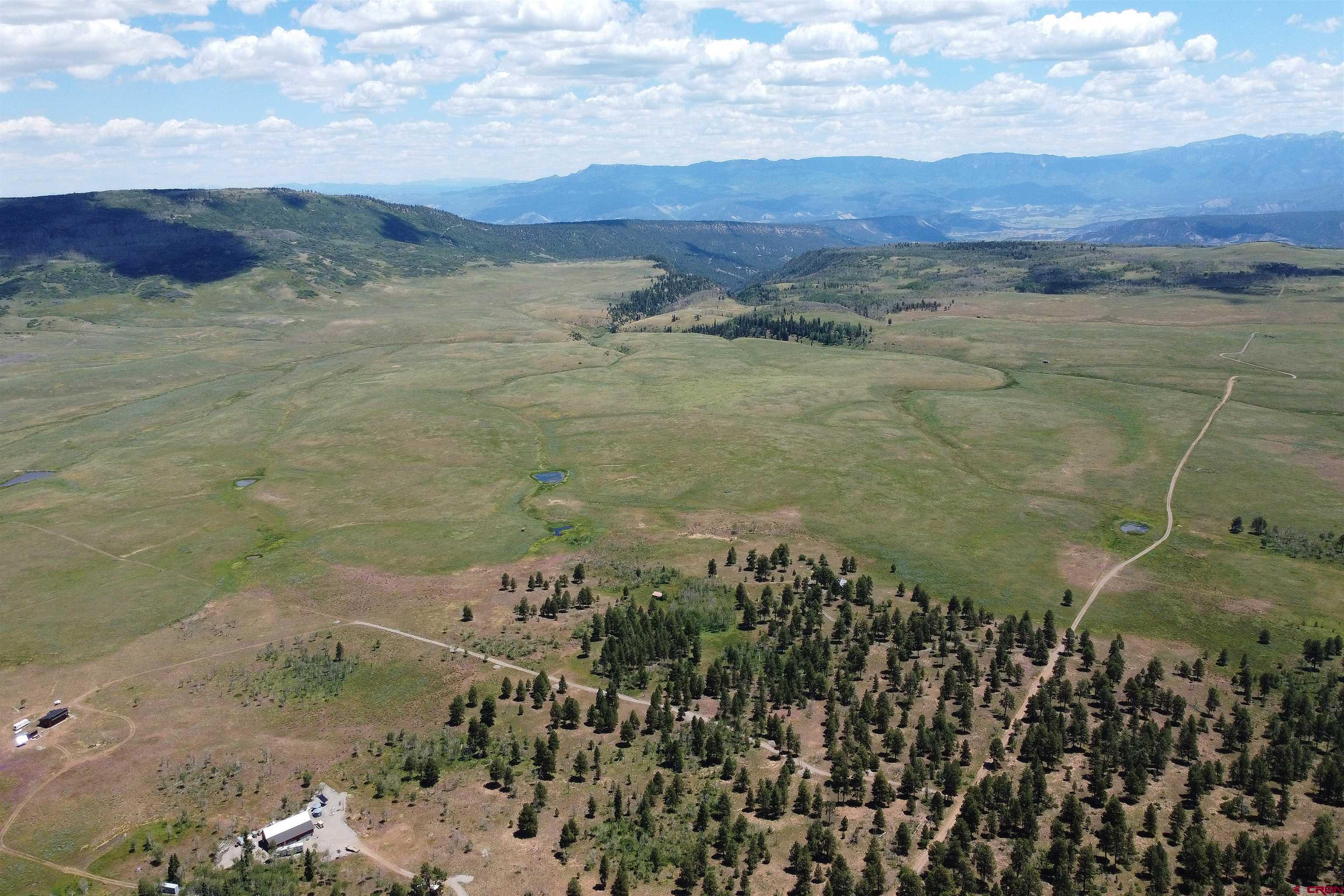 161-ac Tbd Kahvah Lane Placerville, CO 81430 - Photo 6 of 18 a view of a lake with a mountain