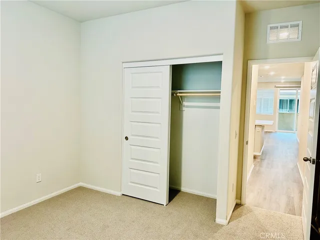 an empty room with closet