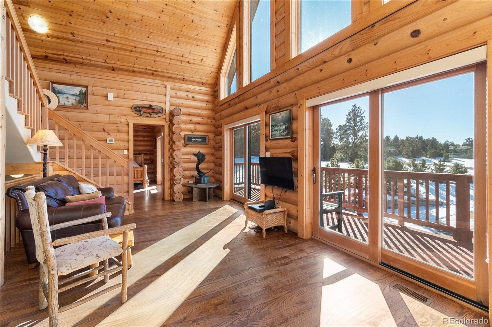 17245 Elbert Road Peyton, CO 80831 - Photo 11 of 45 a gym equipment with wooden floor