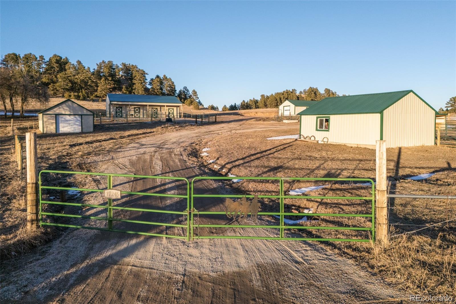 17245 Elbert Road Peyton, CO 80831 - Photo 34 of 45 a view of a chairs and table on the wooden floor