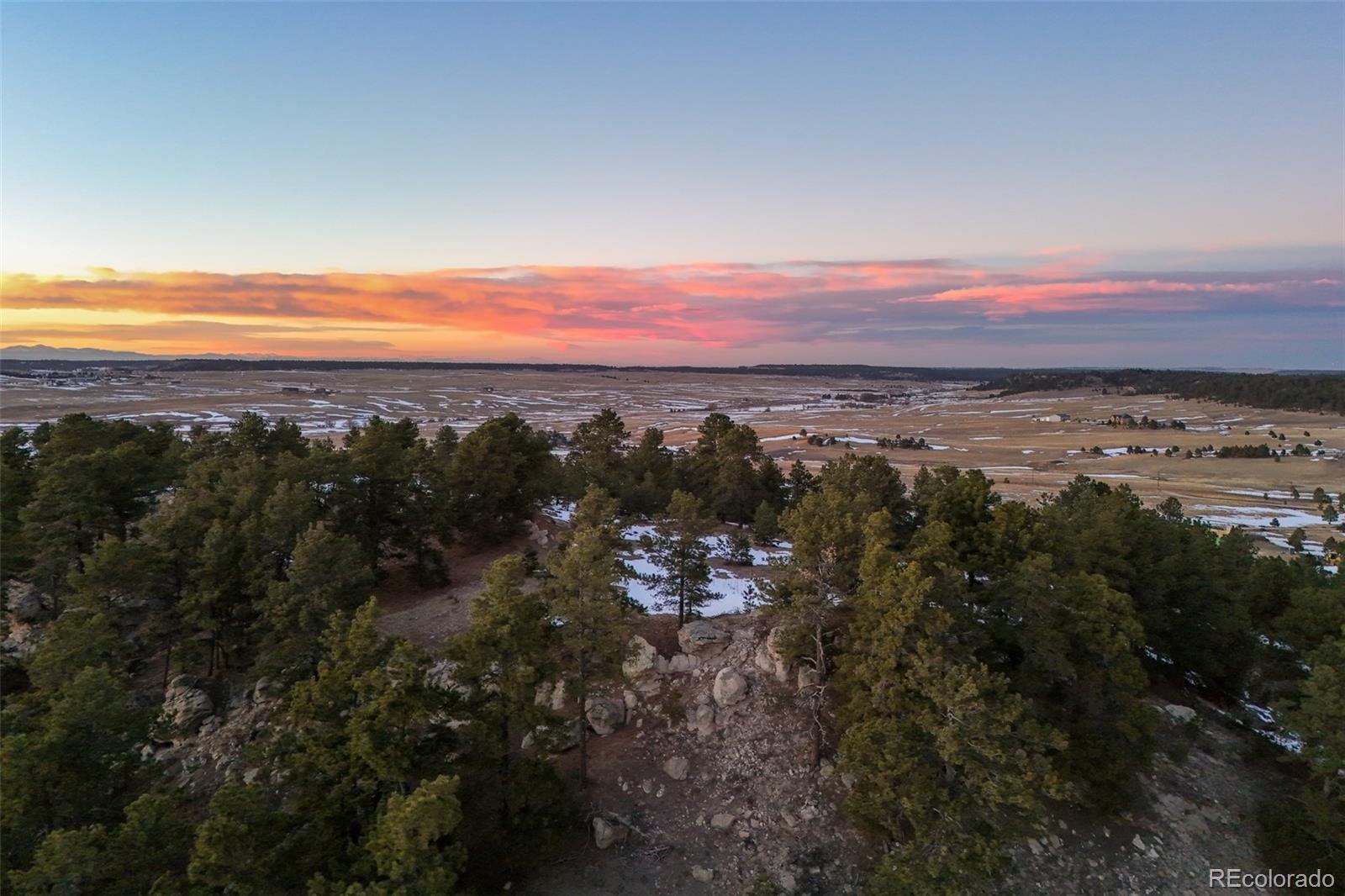 17245 Elbert Road Peyton, CO 80831 - Photo 40 of 45 a view of a city with sunset