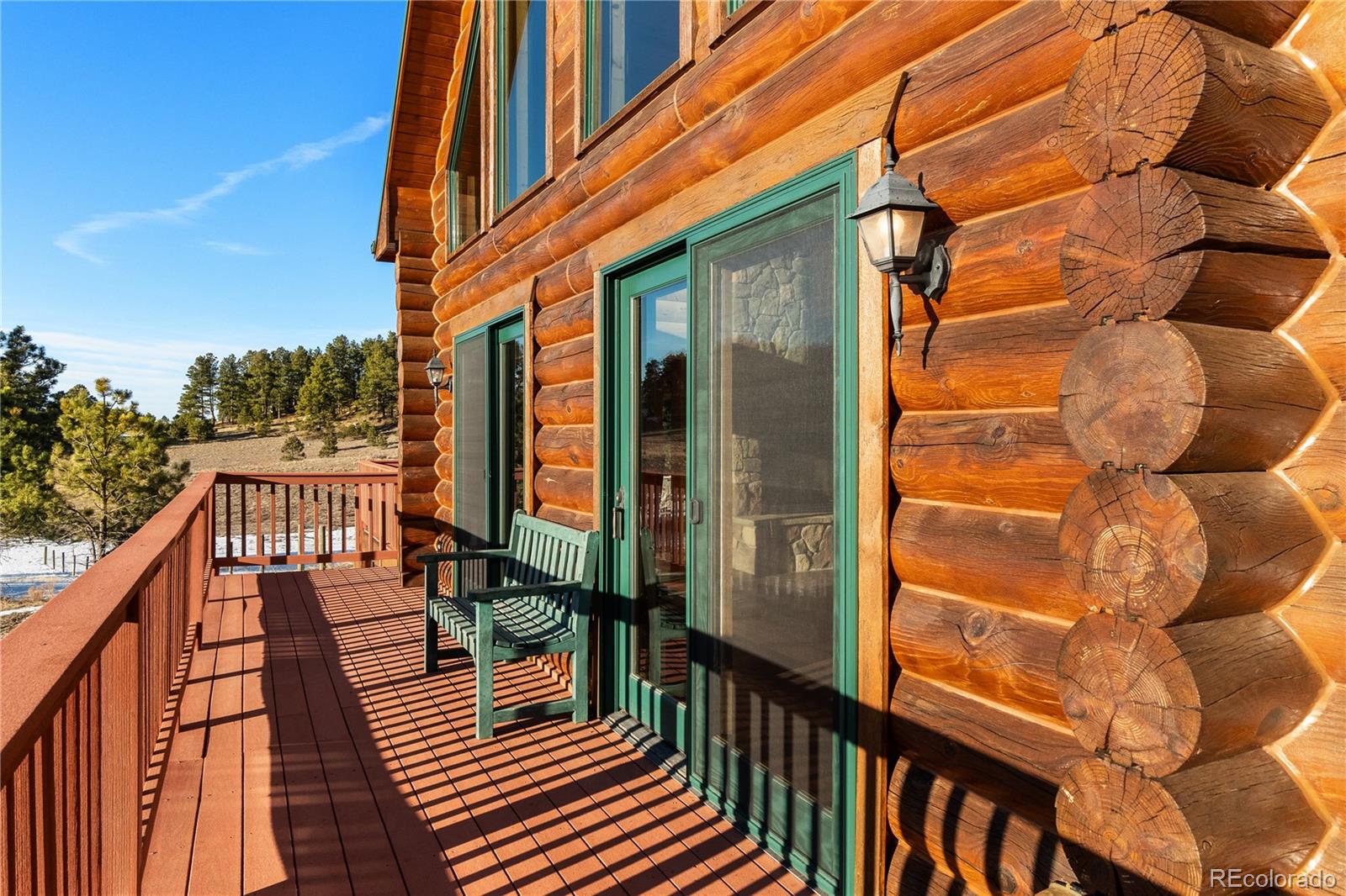 17245 Elbert Road Peyton, CO 80831 - Photo 4 of 45 a view of balcony with wooden floor and seating space