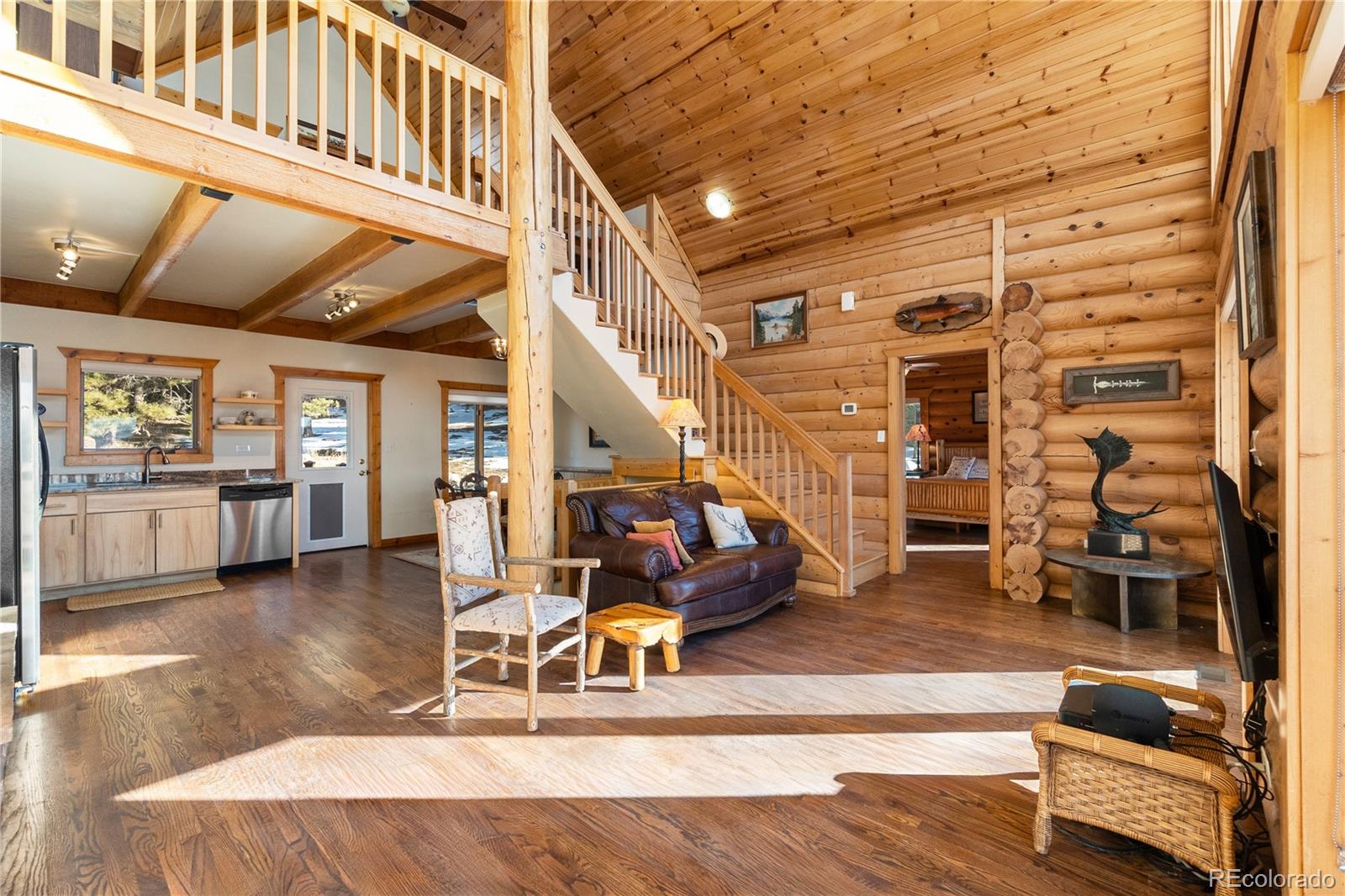 17245 Elbert Road Peyton, CO 80831 - Photo 10 of 45 a view of a livingroom with furniture and a ceiling fan