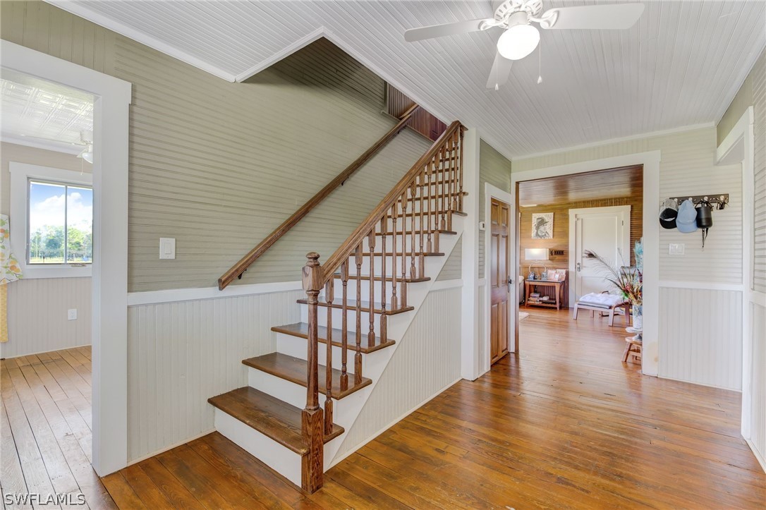 2071 Balsey Road Alva, FL 33920 - Photo 17 of 34 a view of entryway with wooden floor and stairs