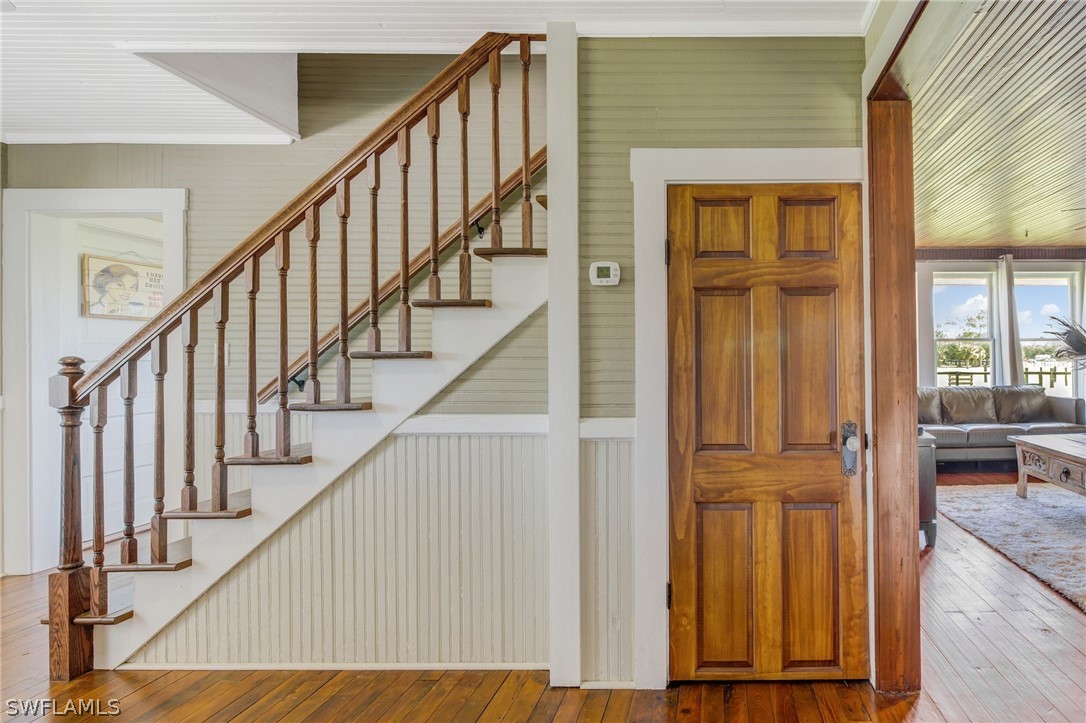 2071 Balsey Road Alva, FL 33920 - Photo 18 of 34 a view of staircase with railing and a dining table