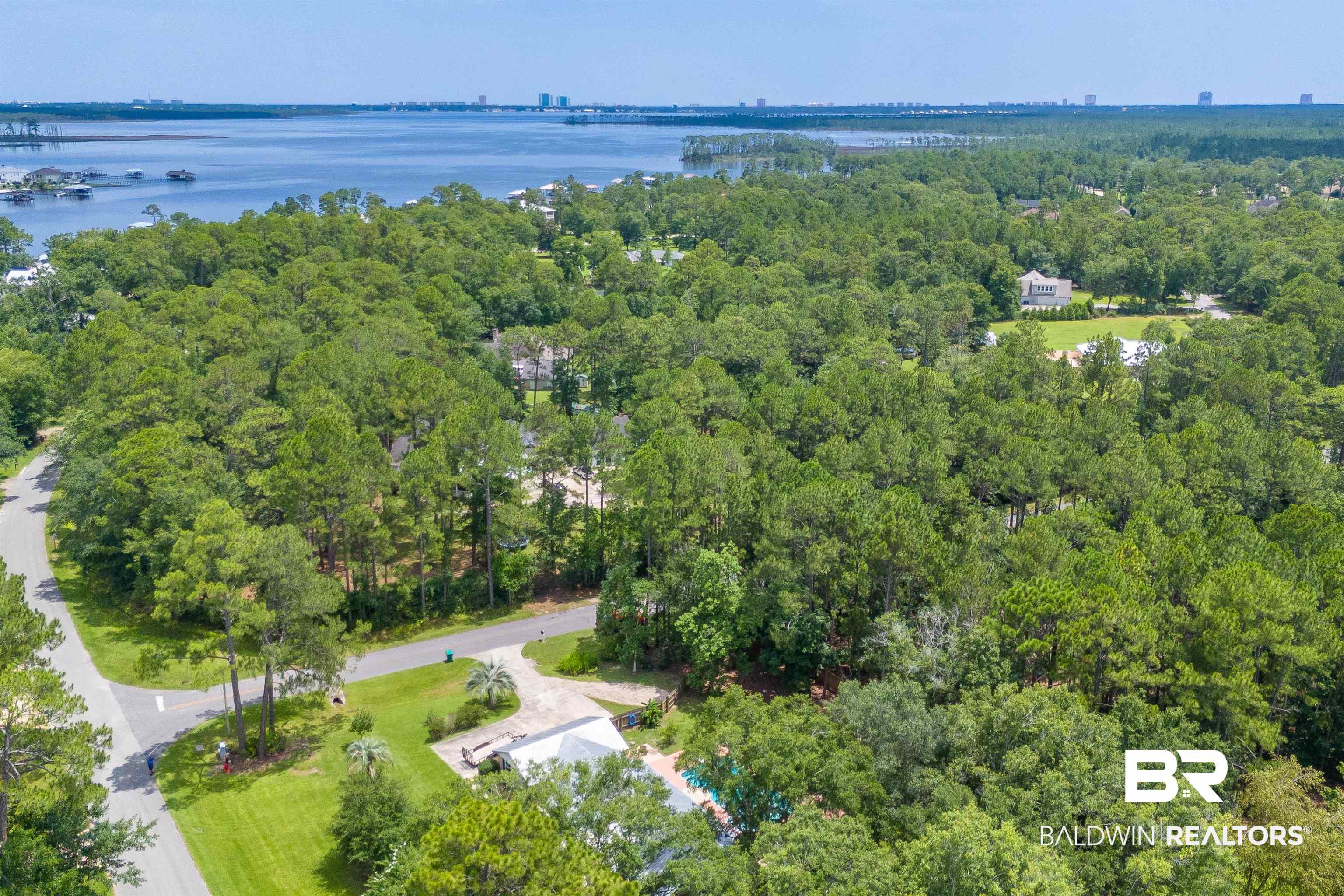 24551 Wolf Bay Drive Foley, AL 36535 - Photo 58 of 59 Bird's eye view of a large body of water