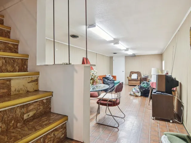 a bedroom with furniture and a couch