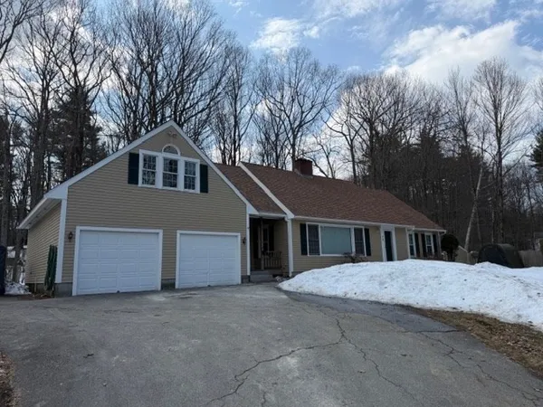 a house with trees in front of it