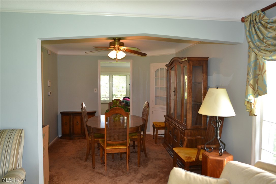 830 Quilliams Road Cleveland Heights, OH 44121 - Photo 7 of 35 The living room flows into the living room, dining room, family room and into the kitchen.