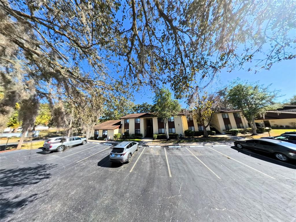 504 Silver Drive, Unit A Ocala, FL 34472 - Photo 2 of 28 a view of street with parked cars