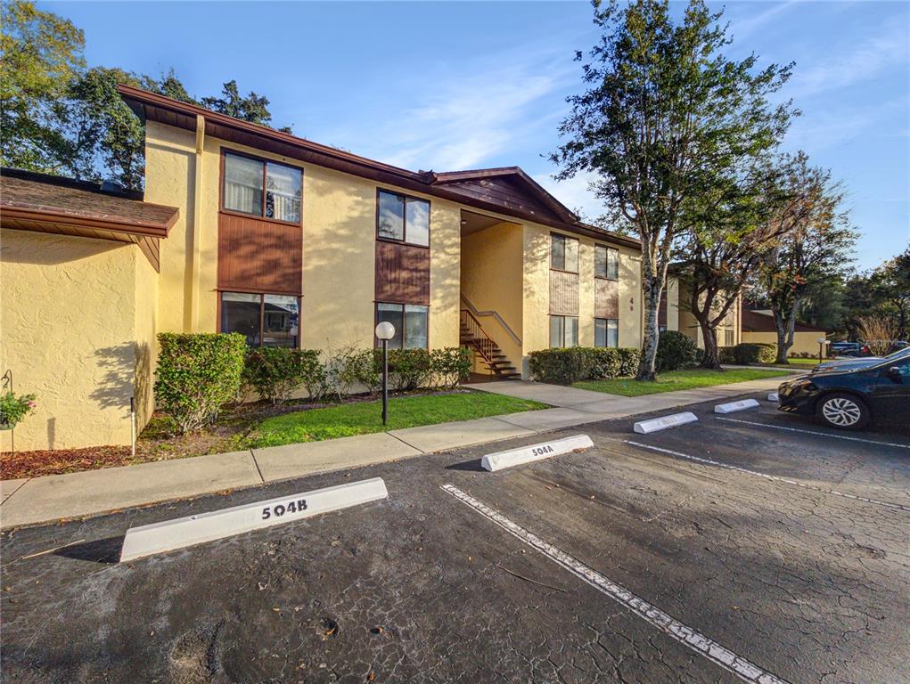 504 Silver Drive, Unit A Ocala, FL 34472 - Photo 3 of 28 a view of a house with a cars park