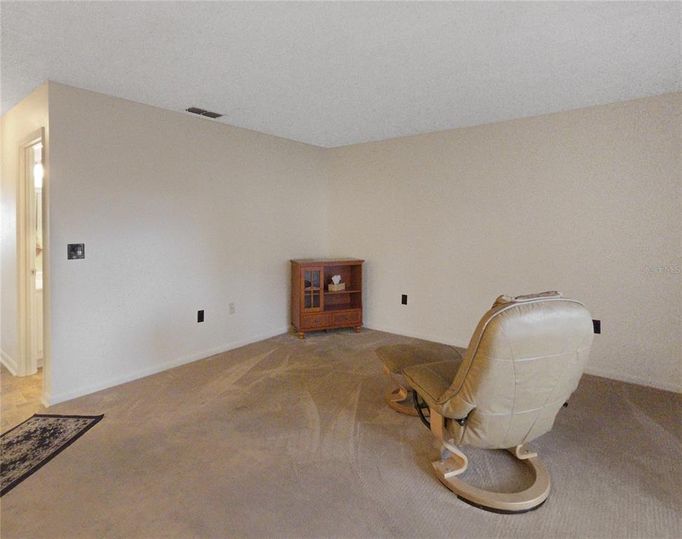 504 Silver Drive, Unit A Ocala, FL 34472 - Photo 6 of 28 a view of a room with a gym equipment