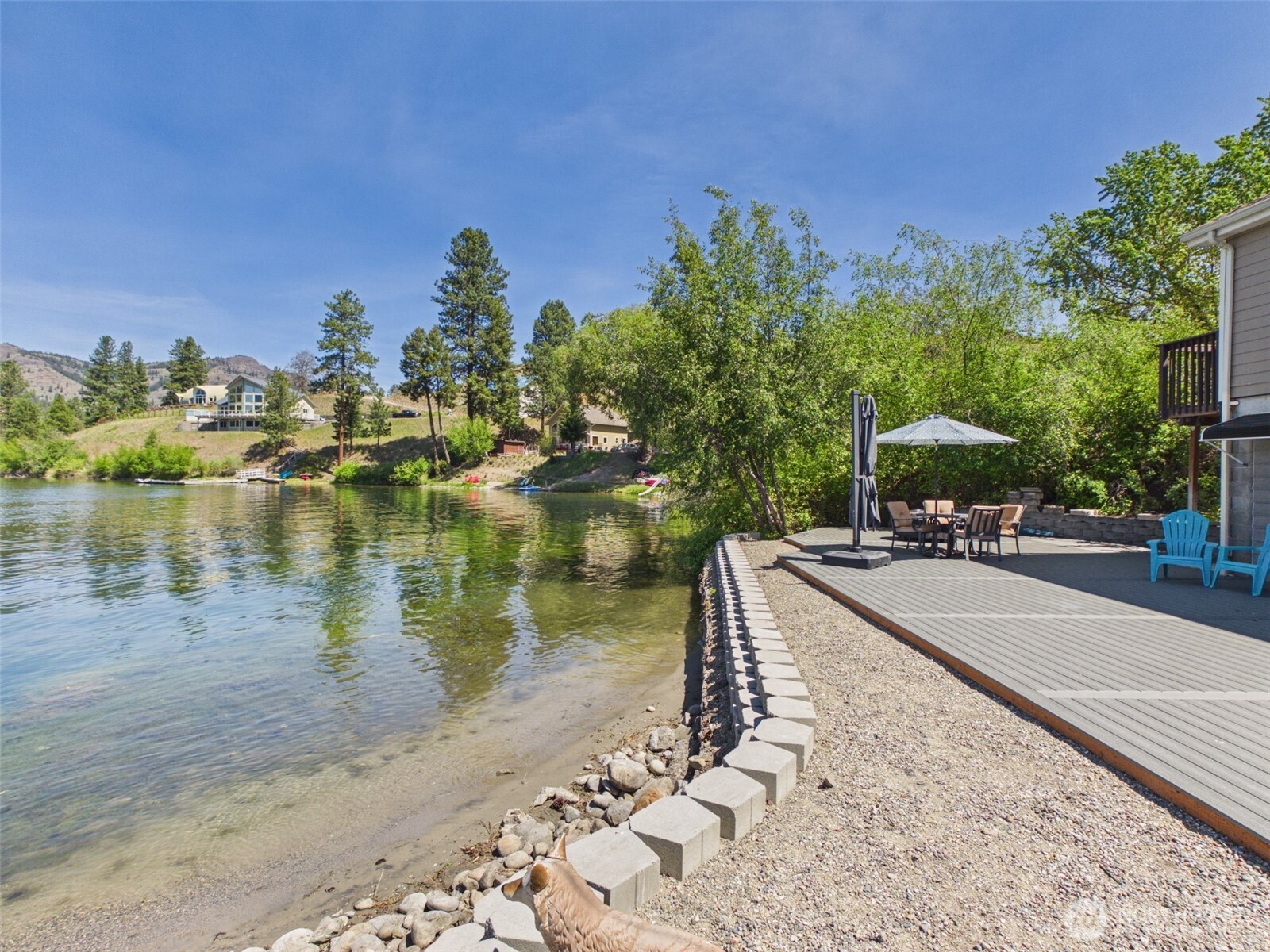 6 Marions Cove Road Republic, WA 99166 - Photo 22 of 33 a swimming pool with outdoor seating and lake view