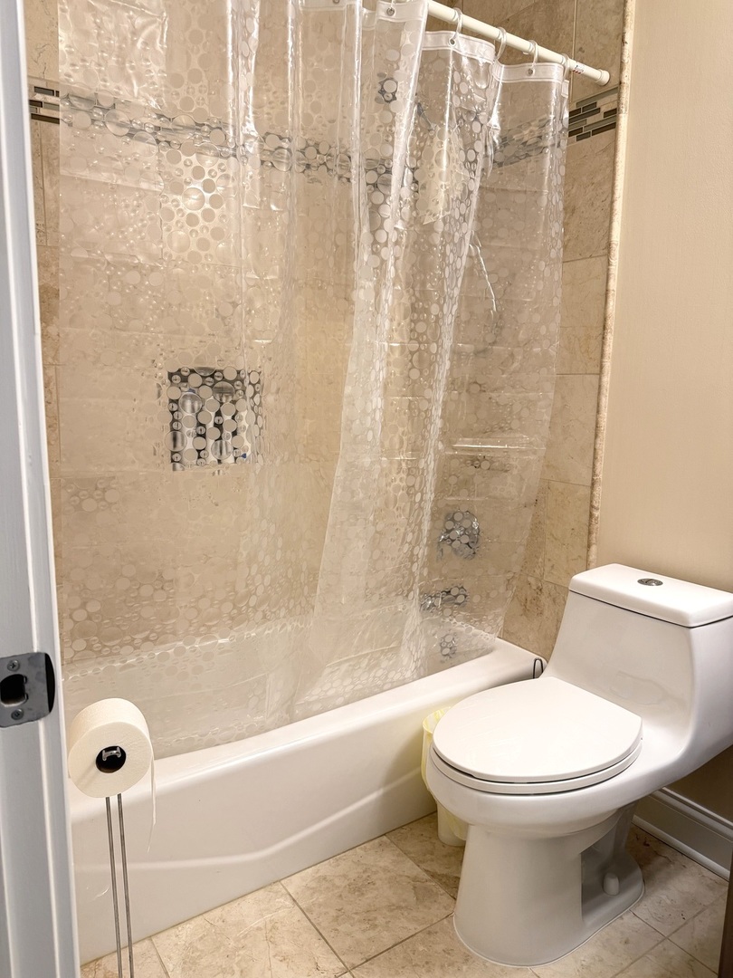 618 East Old Willow Road, Unit 183B Prospect Heights, IL 60070 - Photo 14 of 20 a white toilet sitting next to a bath tub