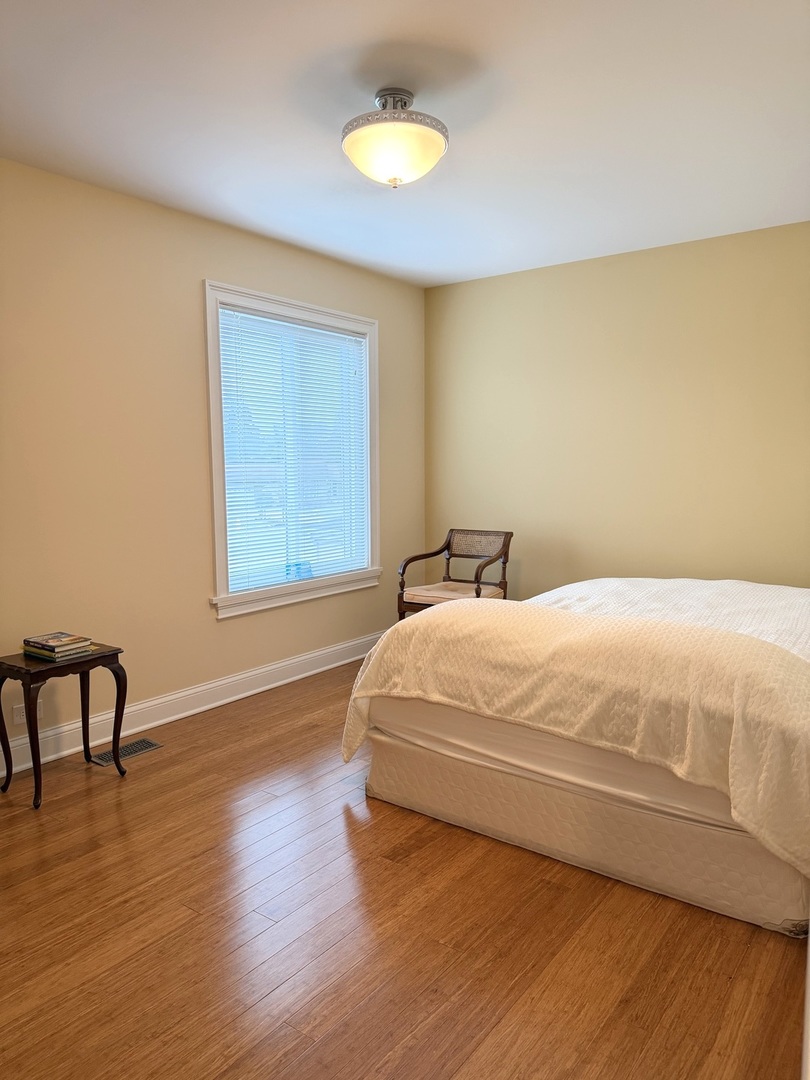 618 East Old Willow Road, Unit 183B Prospect Heights, IL 60070 - Photo 19 of 20 a large white bed in a room next to a window