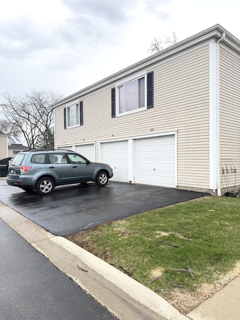 618 East Old Willow Road, Unit 183B Prospect Heights, IL 60070 - Photo 20 of 20 a view of a car parked in front of a house