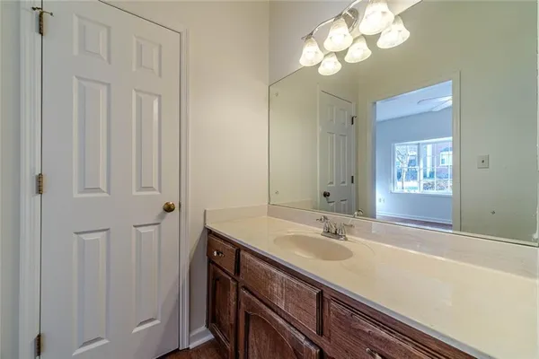 a balcony with wooden floor and fence