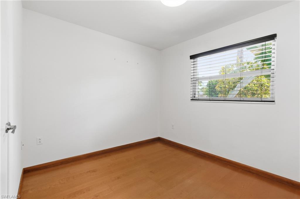 1235 Rordon Avenue Naples, FL 34103 - Photo 19 of 50 an empty room with a window
