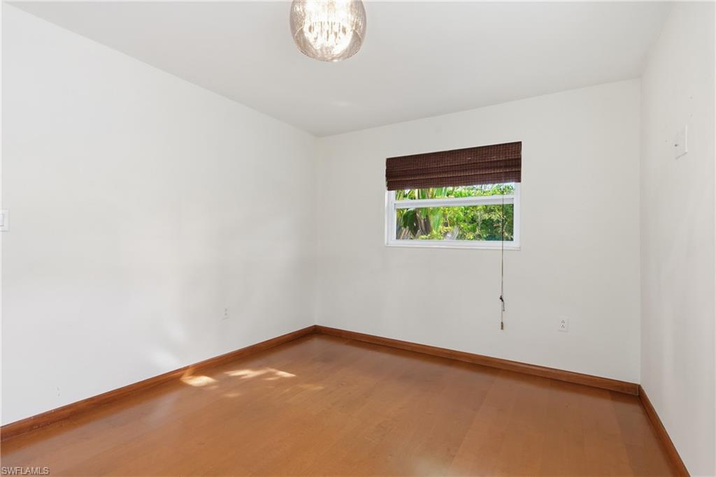 1235 Rordon Avenue Naples, FL 34103 - Photo 27 of 50 an empty room with a window