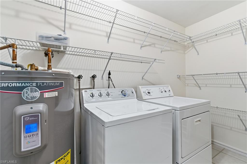 1235 Rordon Avenue Naples, FL 34103 - Photo 34 of 50 a utility room with dryer and washer