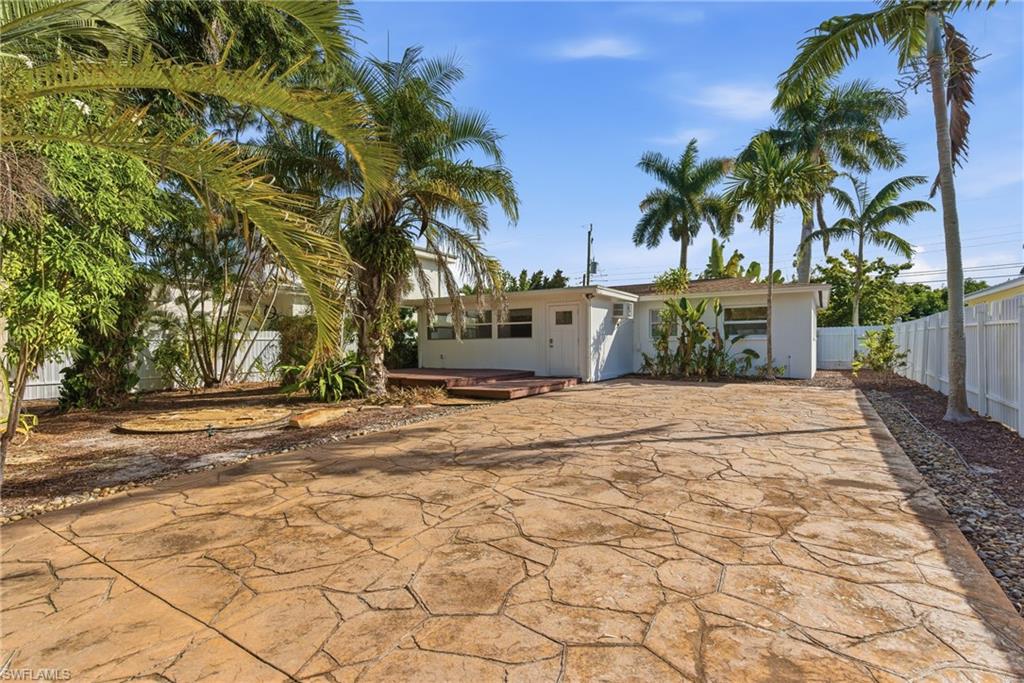 1235 Rordon Avenue Naples, FL 34103 - Photo 40 of 50 a view of a backyard of a house