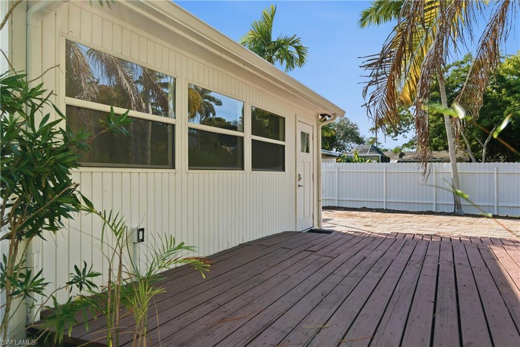 1235 Rordon Avenue Naples, FL 34103 - Photo 41 of 50 a view of a house with a deck