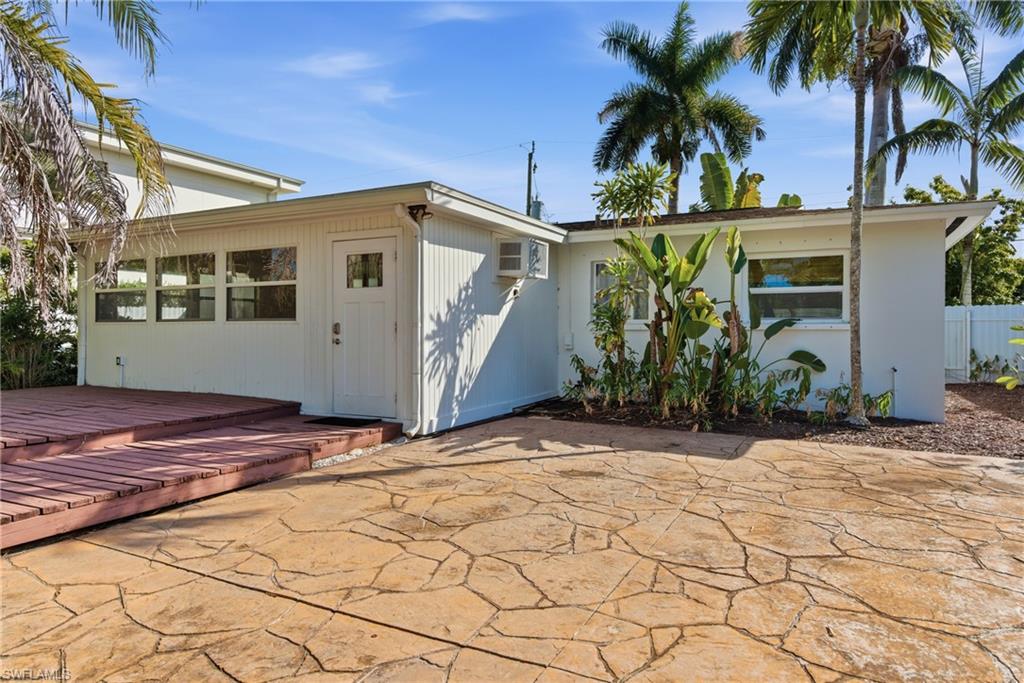 1235 Rordon Avenue Naples, FL 34103 - Photo 42 of 50 a view of a backyard of the house