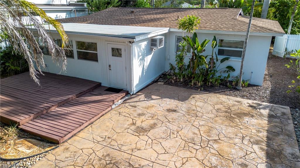 1235 Rordon Avenue Naples, FL 34103 - Photo 49 of 50 a view of a house with a yard